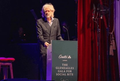 Bob Geldof speaks at a lectern that reads The Gleneagles Gala for Social Bite