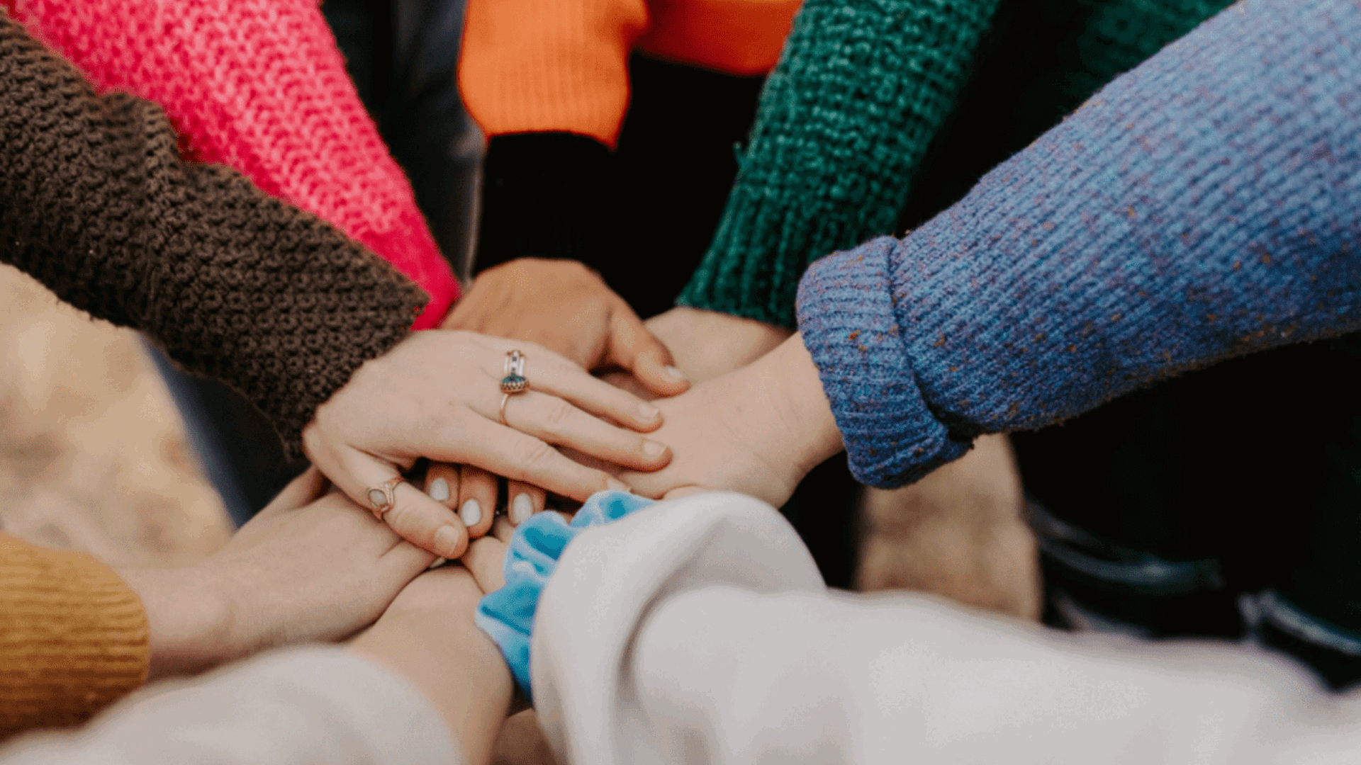 Women's hands on top of each other